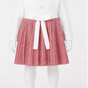 Vestito neonata pois bianco e rosa fronte